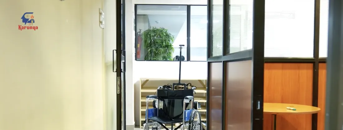 Kabilan KB's autonomous wheelchair in a lab doorway at Karunya Institute